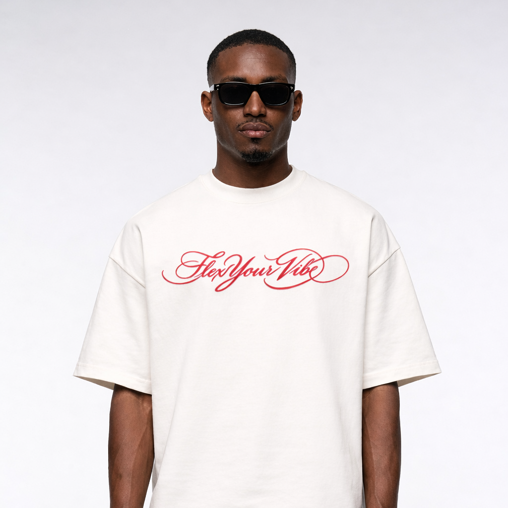 Man wearing a white t-shirt with red text and sunglasses on a white background